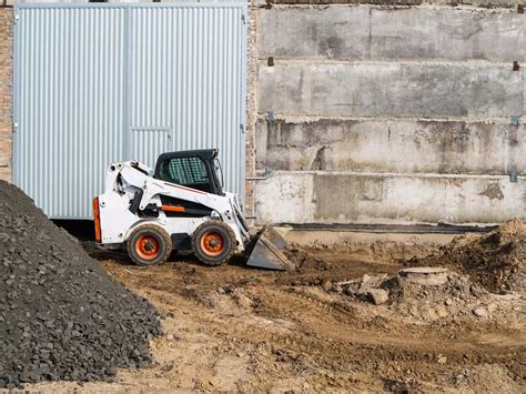 operating skid-steer|tractor begin to skid steer.